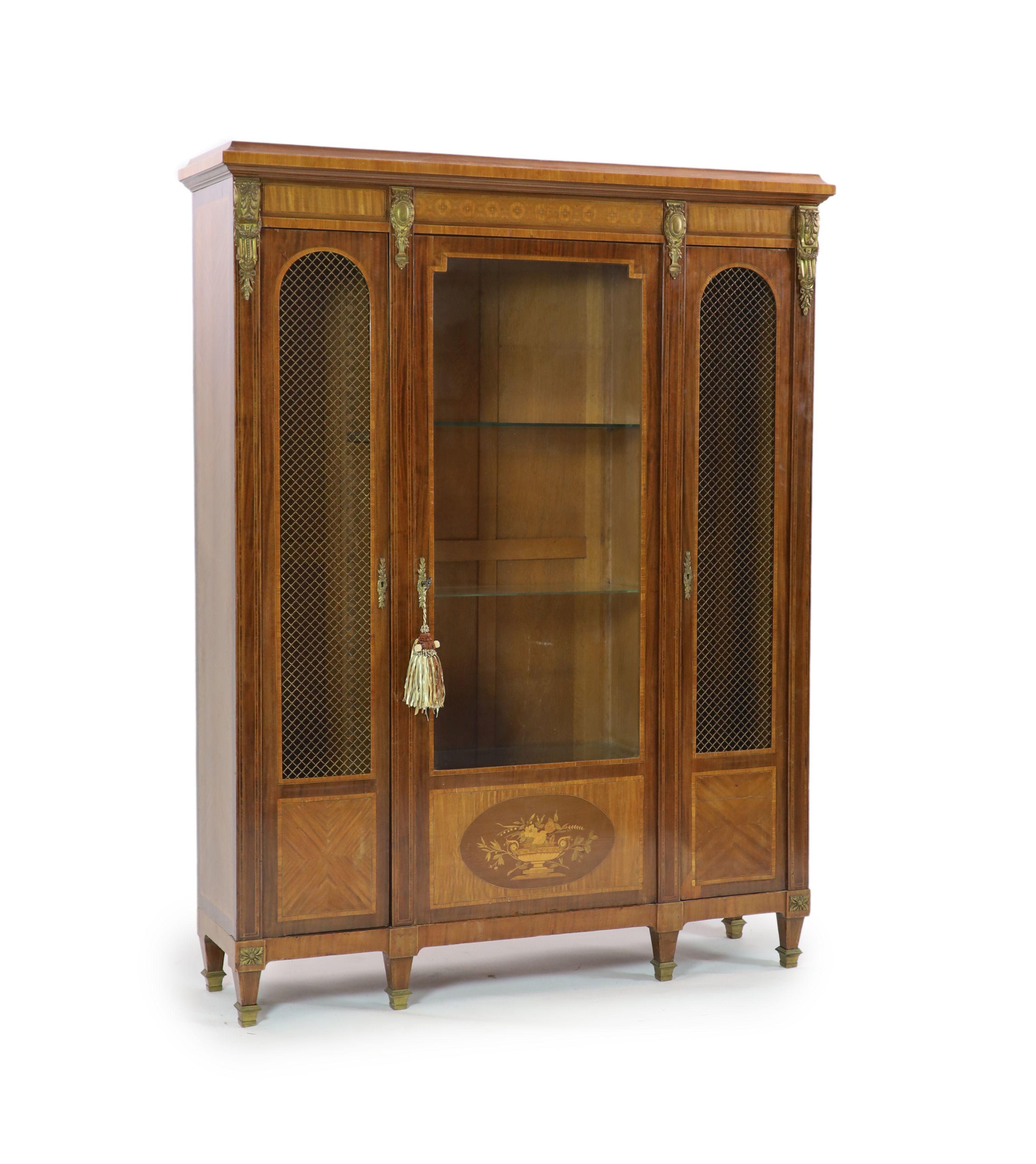 A Louis XVI style inlaid kingwood and ormolu mounted vitrine H 189cm. W 147cm. D 39cm.